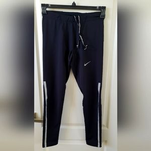 Excellent used condition vomen's Nike dri fit pockets running pants, size M
